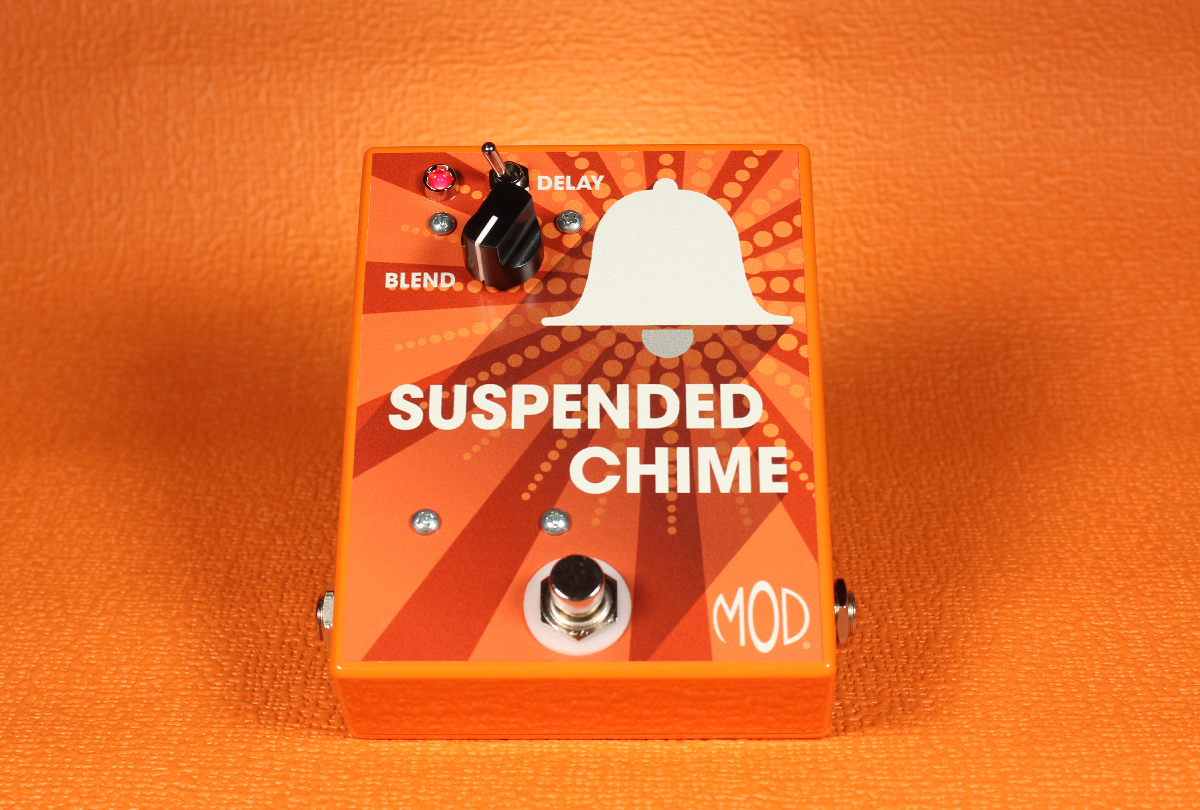 The Suspended Chime on orange background